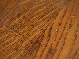 remove burn marks on a hardwood floor