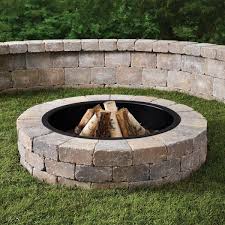 This will give you the overall shape of your pit and allow you to build it by tracing the line with your blocks. Anchor Weston 52 In X 12 In Northwoods Tan Round Concrete Fire Pit Kit With Metal Liner 70300879 The Home Depot