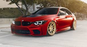 red bmw m3 tries to look special with