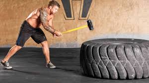 training with sledgehammers and tires