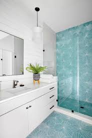 shower with turquoise blue cement tiles
