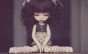 sad doll sitting 7029606