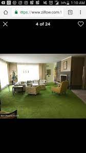 living room with bright green carpet