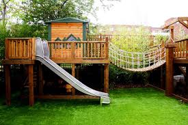 Come see five awesome backyard playsets at howstuffworks. 10 Fun Playgrounds And Treehouses For Your Backyard Diy Playground Backyard Landscaping Designs Backyard Playground