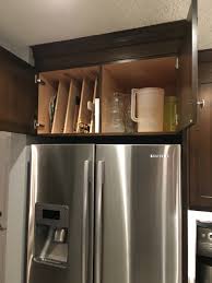 Check out the latest home appliance reviews from good housekeeping. Deep Storage Cabinet Above Refrigerator Transitional Kitchen Houston By Bay Area Kitchens Houzz