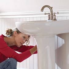 how to move a bathroom sink handyman tips