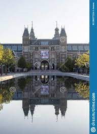 Exterior of the Rijksmuseum Reflected in the Water, Early Morning in  Amsterdam, Noord-Holland, the Netherlands Stock Photo - Image of  architecture, historical: 230277224