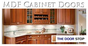 It's an engineered wood product made from broken down wood residuals, wax, and a resin binder. Mdf Cabinet Doors Custom Kitchen Glass The Door Stop