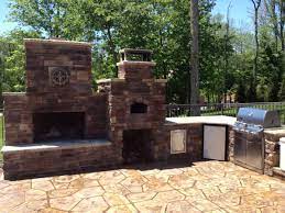 diy outdoor fireplace and pizza oven