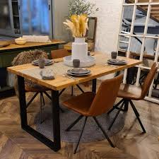 solid oak dining table with raw steel