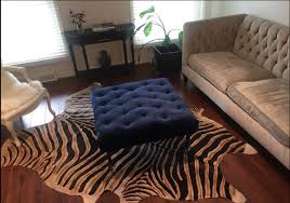 zebra cowhide rug approx size 7 x 7