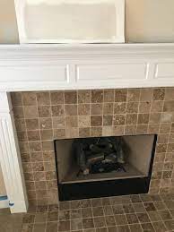 replace travertine stone fireplace tile