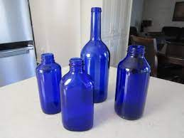 4 Vintage Cobalt Blue Glass Bottles