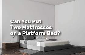 Two Mattresses On A Platform Bed
