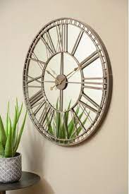libra skeleton mirror wall clock