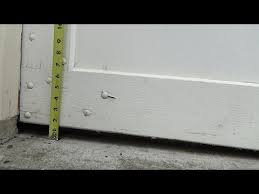 seal garage door bottom from gaps
