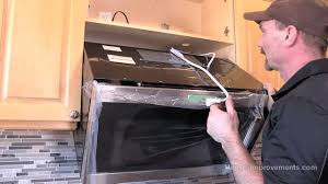 how to install a microwave over the