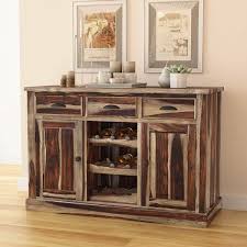 Made from reclaimed wood with rich patina Hosford Rustic Solid Wood Bar Buffet Cabinet With Wine Display Rack