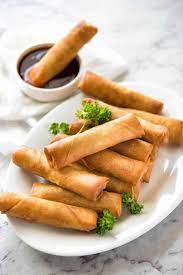 In a large bowl, mix the vermicelli, eggs, onion, mushrooms, shrimp, pork, vegetable oil, carrot, crabmeat, bean sprouts, pepper, soy sauce, fish sauce and garlic. Spring Rolls Recipetin Eats
