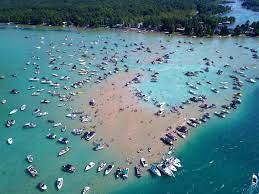 how deep is torch lake discover