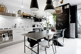 A table with metal legs and a shelf. 25 Breathtaking Industrial Kitchen Ideas You Have To See