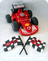 Shield is shown on a 9 round cake. Edible Handcrafted Formula 1 Ferrari Racing Car Cakecentral Com