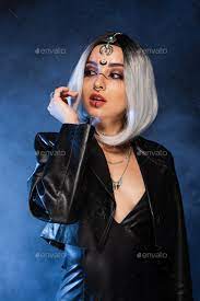 y ash blonde woman in witch makeup