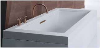 The tub is made of strong fiberglass that is a snap to clean. Kohler 1137 0 Underscore Rectangle Bathtub White Freestanding Bathtubs Amazon Com