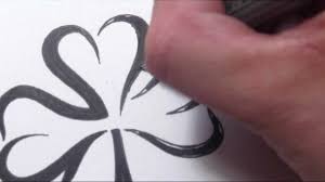 drawing a simple 3 leaf clover tribal