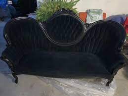 black victorian gothic sofa in