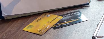 comparing credit cards fees benefits