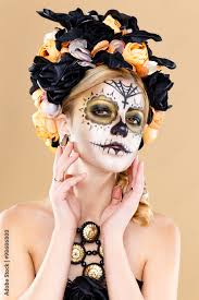 attractive young woman with sugar skull