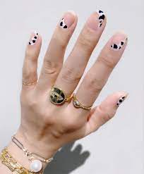 cow print nails with negative e