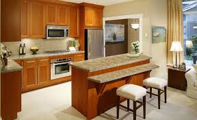 A person of average height can quickly access it from a standing position with his arms comfortably outstretched. Casual Kitchens Breakfast Bar Basics