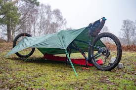 set up a tarp shelter using your bike