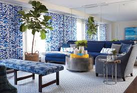 blue living room with mirrored accent
