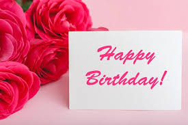 happy birthday text on card in flower