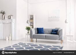 grey sofa white apartment interior