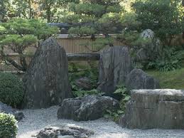 Arranging Stones In A Japanese Style Garden