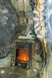 Stone Wall Fireplace With Hand Model