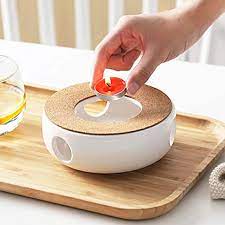 Maybe you would like to learn more about one of these? Teapot Warmer Base Porcelain Heating Ceramic White Tea Cosy Coffee Maker Base With Cork Mat Tea Warmer Tea Set Accessories Retro Tea Light Holder Amazon De Home Kitchen
