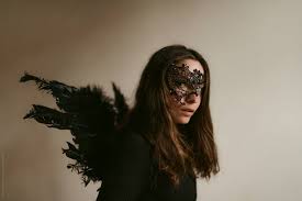 mask with wings like dark fallen angel