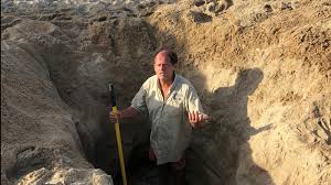 Digging deep holes on the beach can be deadly : NPR
