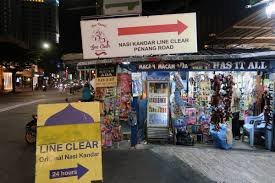 If you're walking from lebuh chulia, keep to the left hand side and you should see the above yellow signboard on the walkway once you turn left onto jalan penang. Nasi Kandar Line Clear Restaurant Penang One Of The Best Meals I Had