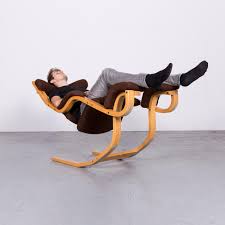 The gravity balans armchair was designed by peter opsvik for stokke møbler in 1984. Stokke Gravity Balans Designer Fabric Chair Rocking Chair Brown Pattern Look At 1stdibs