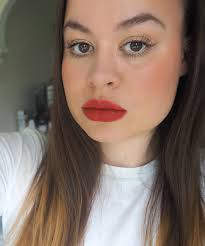 chagne eyeshadow and a bold red lip