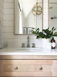 natural bathroom cabinetry and shiplap