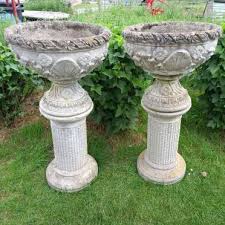 Decorative Urns On Plinths