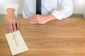 Insert the letter into the envelope. A Businessman Handing And Sending In A Envelope Letter On A Wooden Table To His Boss Change Of Job Unemployment Concept Stock Photo Bc0bc6b5 8268 4848 A70f Ed76d445e8cc