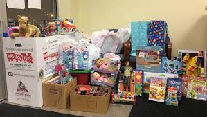 donations pile up for toys for tots